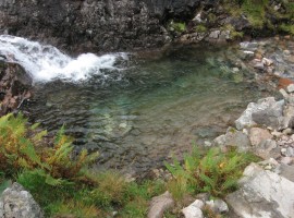 Clear stream water in Coire nan Lochan