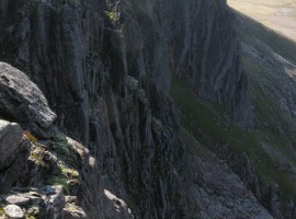 The cliffs below Cairn an Lochan, with climbers