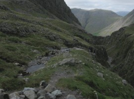 Piers Gill runnng into the deep chasm