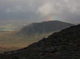 Rainbow over Beinn nam Ban on the Badrallach road