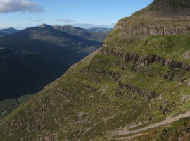 Beinn na h-Eaglaise and Beinn Damph seen over the side of Liathach