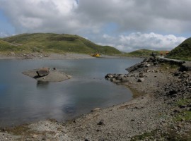 Helicopter on loch shore